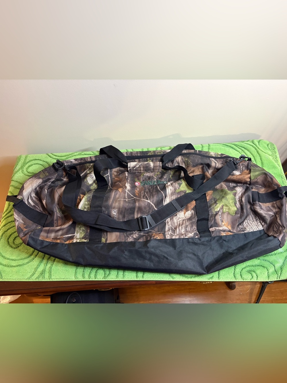 Gander man camouflage duffle bag, two carry handles and removable shoulder strap